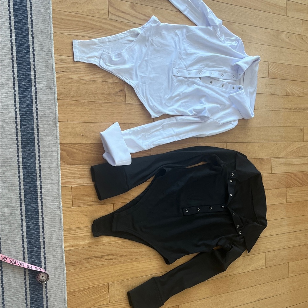 White and Black Long Sleeve Bodysuits